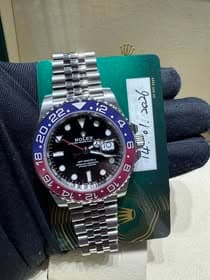 May be an image of wrist watch and text that says '22 2 2 S RO ROLEX OL EX TER FERPE חשר THAL ለለለሱ 2026 dd mm. 6 OmlE 顺力 0 عدد TO CMT GMT-MASTERL CH731202- MASTER 18 شه 与 ف 16 E…