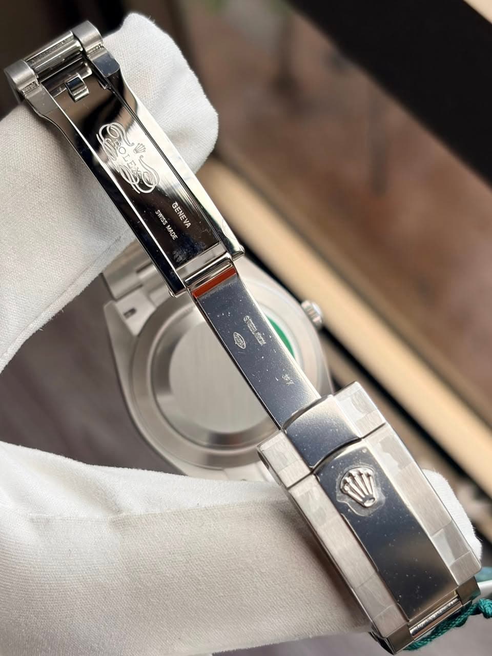 May be an image of wrist watch and text
