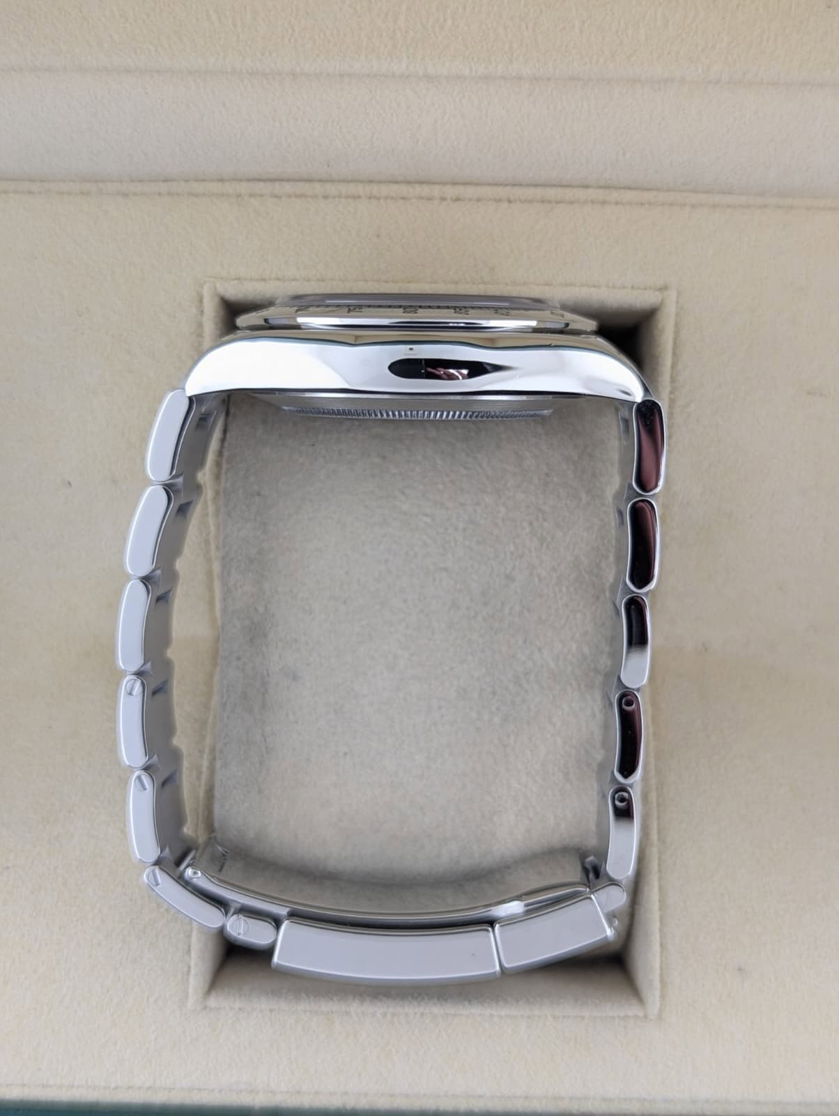 May be an image of wrist watch and ring