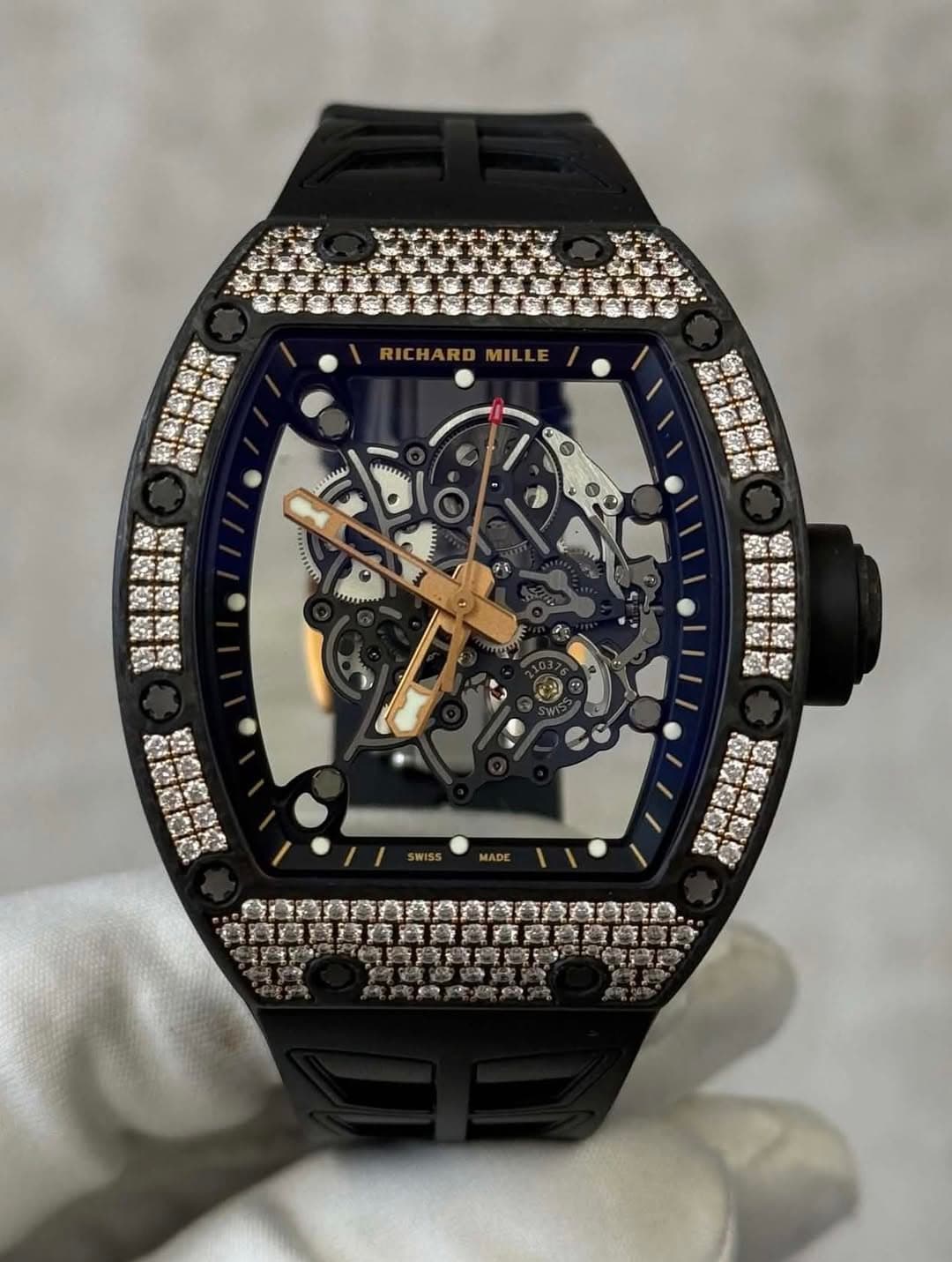 May be an image of wrist watch and text
