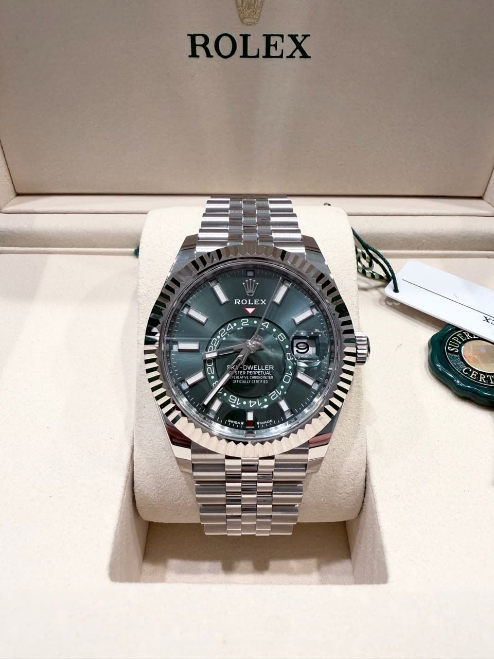 May be an image of wrist watch and text