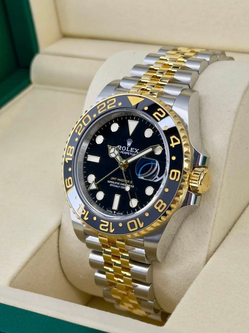 May be an image of wrist watch and text