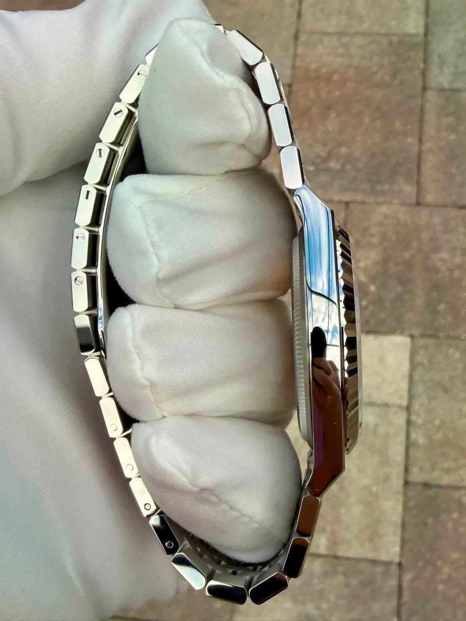 May be an image of jewelry and wrist watch