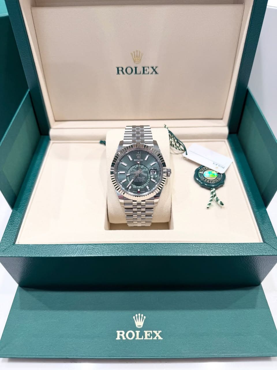 May be an image of wrist watch and text