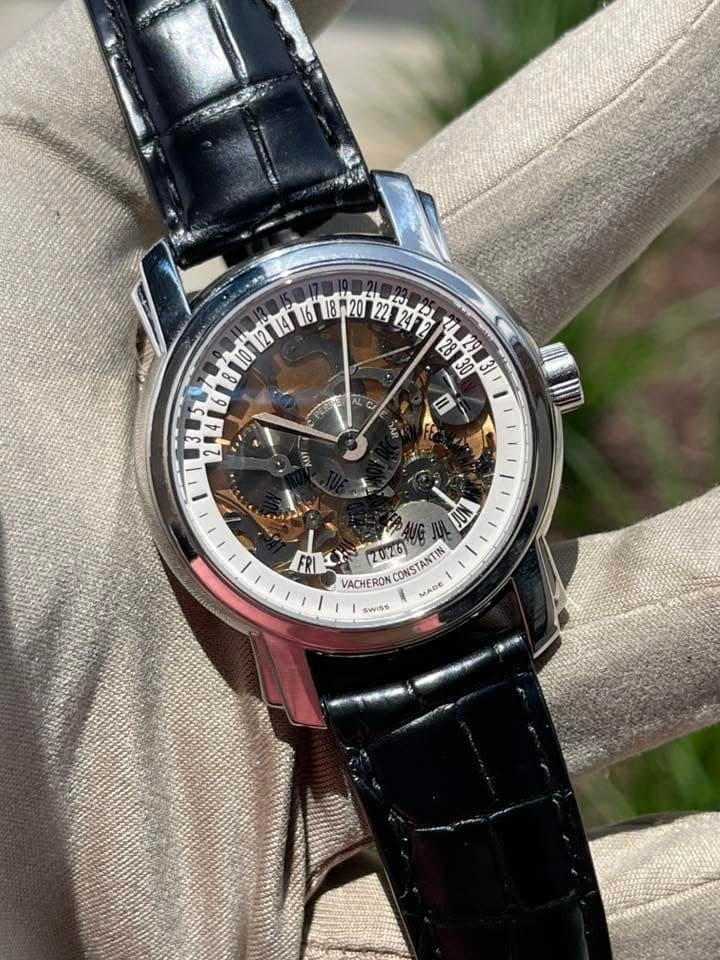 May be an image of wrist watch and text