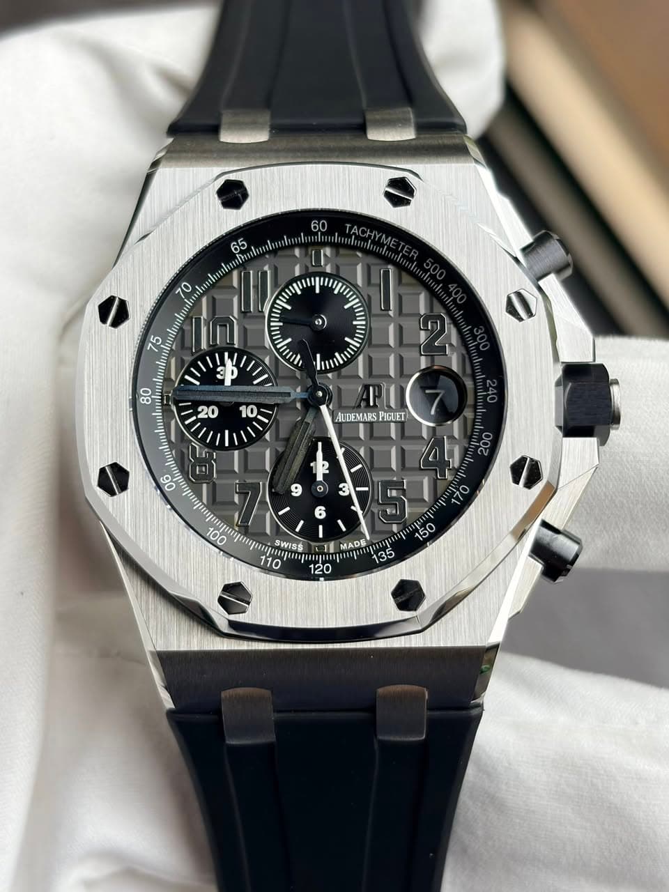 May be an image of text that says '60 65 TACHYM 70 75 ) ml W 3P 80 20 10 AUDEMARS PIGUET 06 F - - Ia 6 دو M0 170 100 វអផត 110 ម្តន p SWISS MA MADE '